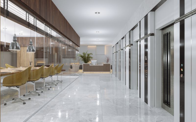 Empty Office Corridor With Meeting Room, Reception Desk And Elevators